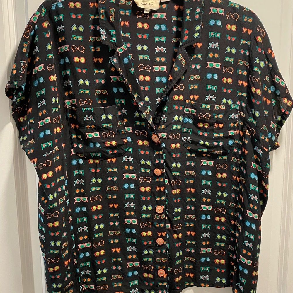 Sunglasses silk blouse.